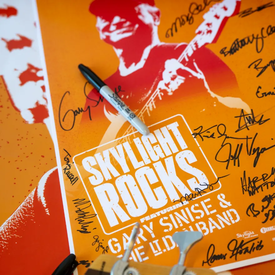 Signed event poster